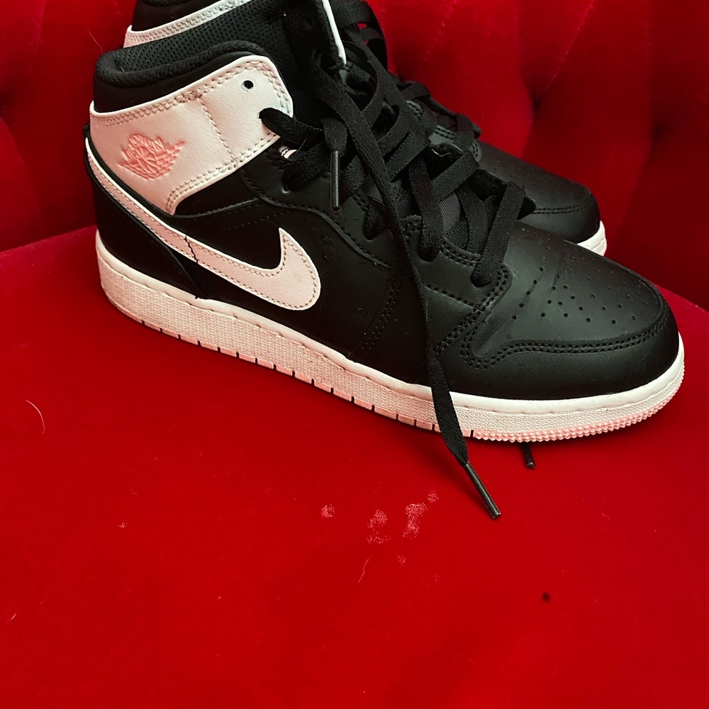 Nike Women’s Black and White High-Top Sneakers
